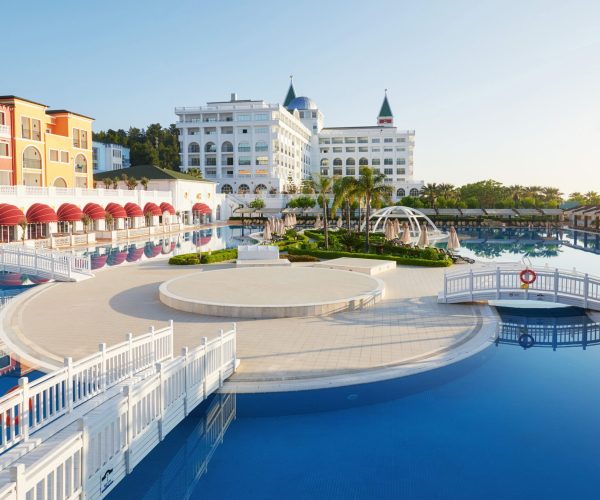 Swimming pool and beach of luxury hotel and outdoor pools and a spa. Amara Dolce Vita Luxury Hotel. Resort. Tekirova-Kemer. Turkey